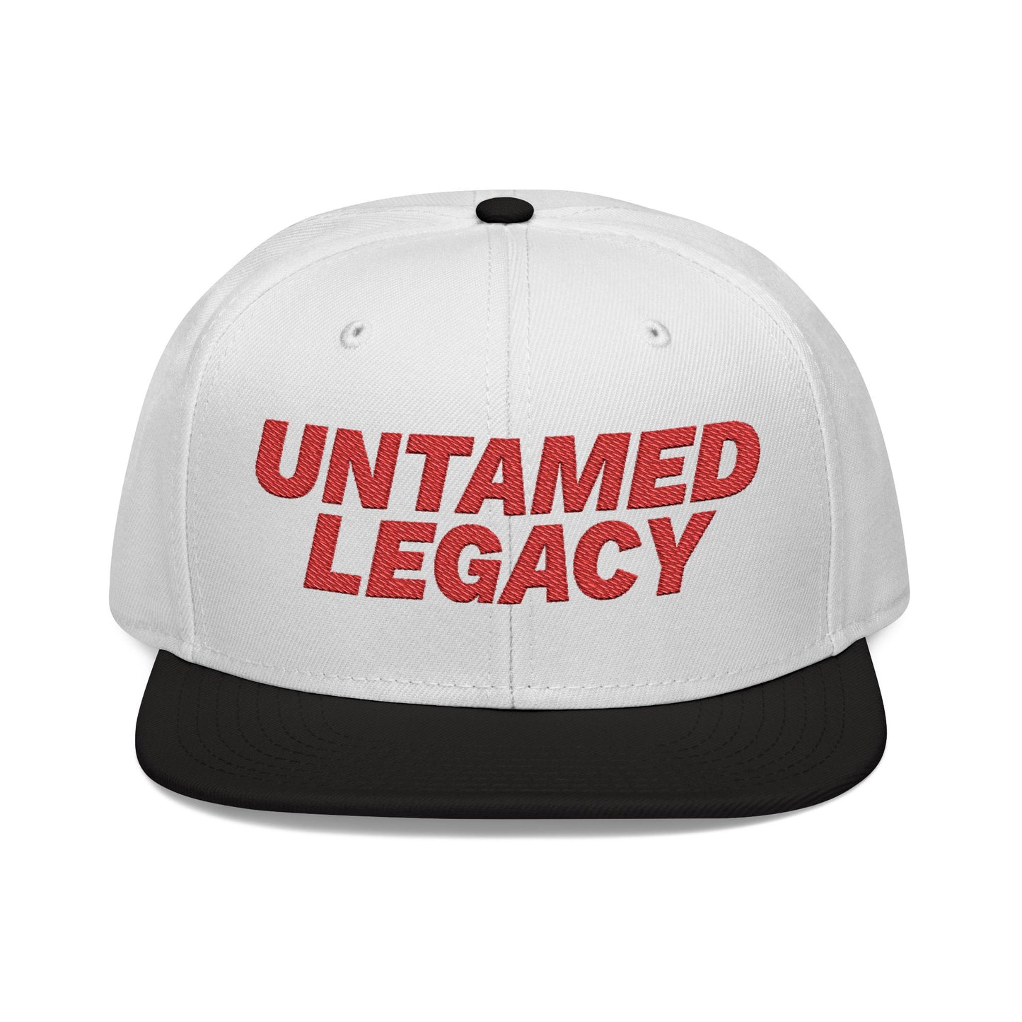 White snapback hat with contrasting black brim and bold red embroidered “Untamed Legacy” logo — a timeless urban essential.