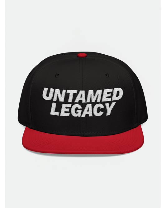 Eye-catching black snapback cap with red brim and white “Untamed Legacy” embroidery — a statement piece for bold looks.