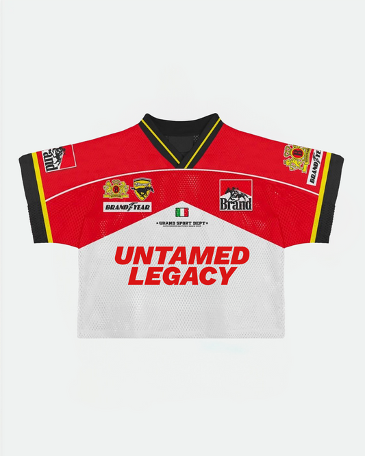 “Untamed Legacy racing mesh jersey in red and white with sponsor patches and bold streetwear logo design”